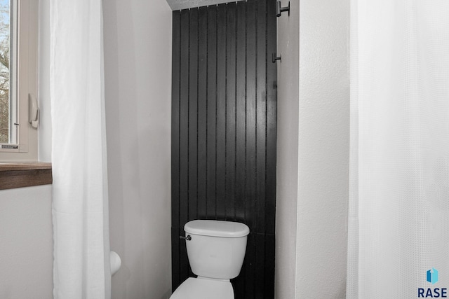 bathroom featuring toilet