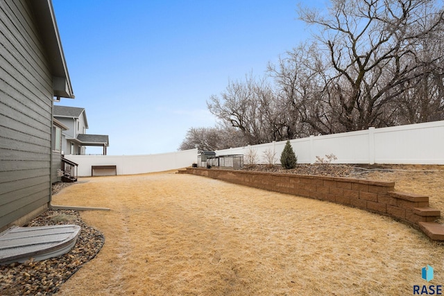 view of yard with fence