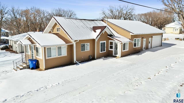 exterior space with metal roof