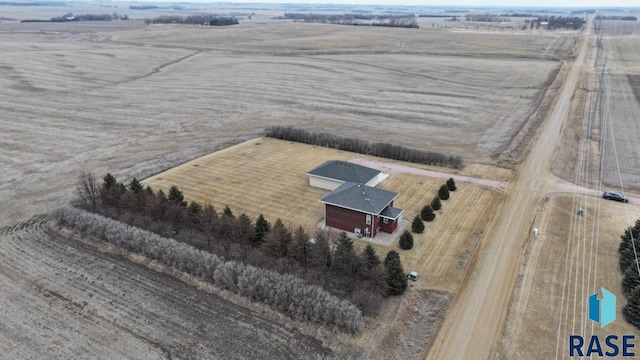 birds eye view of property featuring a rural view