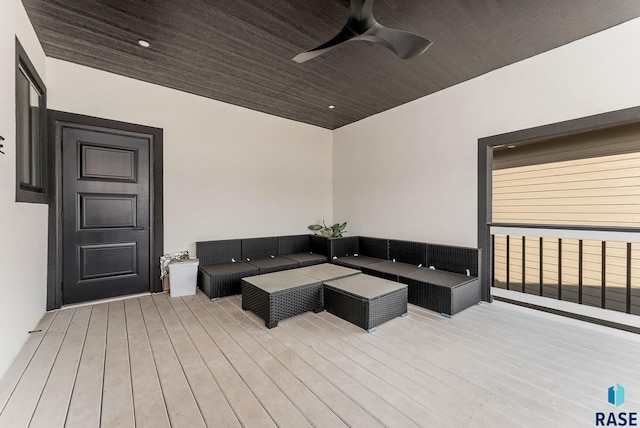 wooden deck featuring ceiling fan and an outdoor hangout area