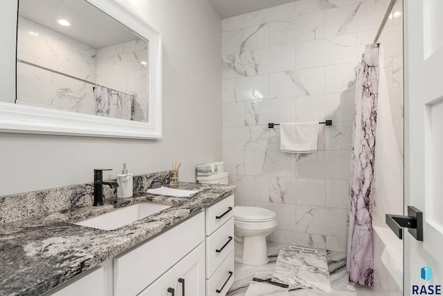 bathroom featuring toilet, marble finish floor, vanity, and a shower with curtain