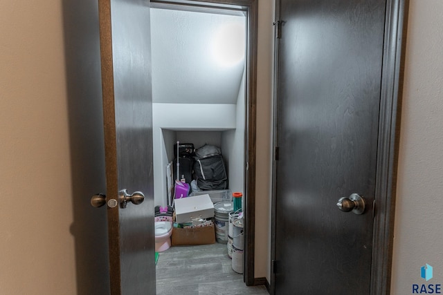 hallway with wood finished floors