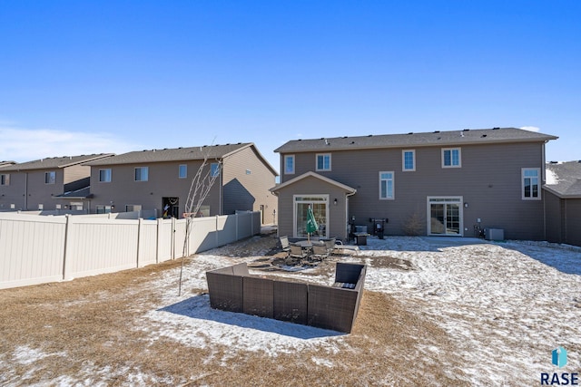 back of house featuring central AC, a patio, and fence