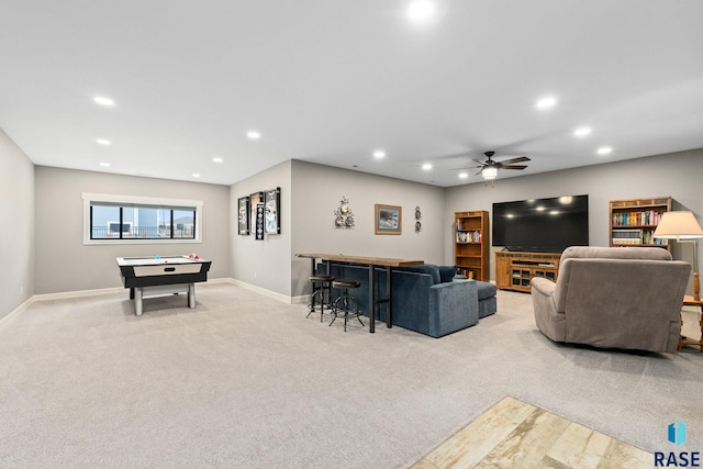 living area featuring baseboards, carpet floors, a dry bar, and recessed lighting