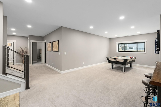 playroom with baseboards, recessed lighting, and light colored carpet