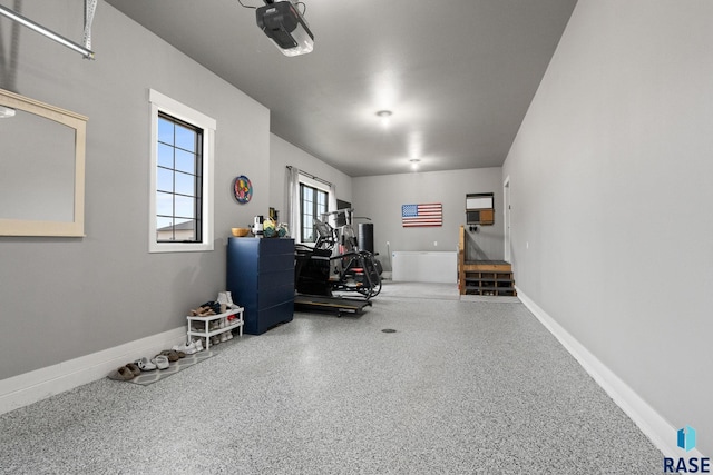 home office featuring baseboards and speckled floor