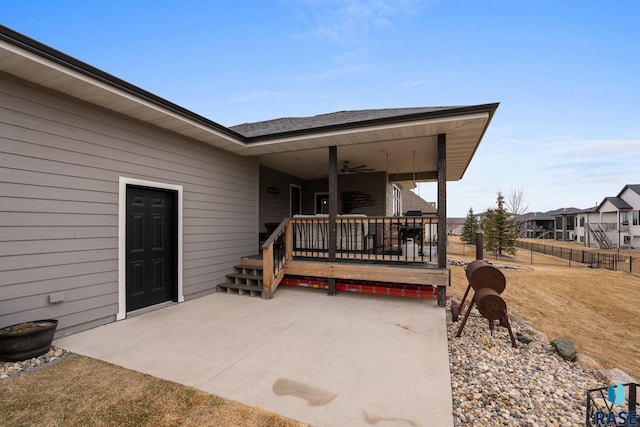 view of patio featuring fence