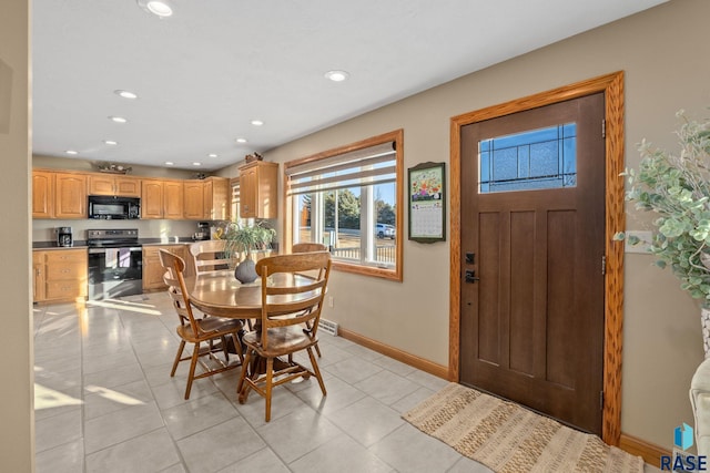 dining room featuring light tile patterned flooring, baseboards, and recessed lighting