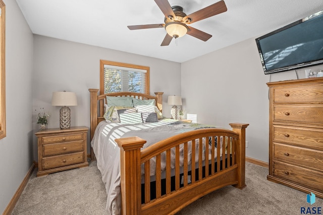 bedroom with carpet floors, baseboards, and a ceiling fan