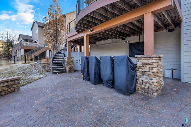 view of patio featuring stairway