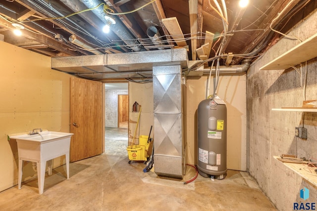 unfinished basement featuring electric water heater