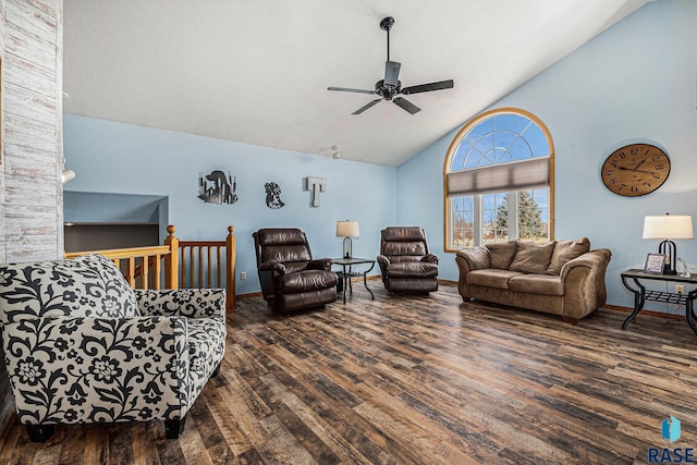 living room featuring baseboards, ceiling fan, high vaulted ceiling, and wood finished floors