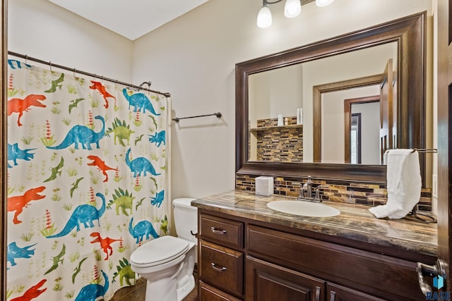 bathroom with vanity, a shower with shower curtain, toilet, and tasteful backsplash