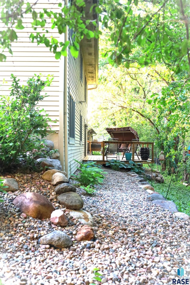 view of yard with a deck