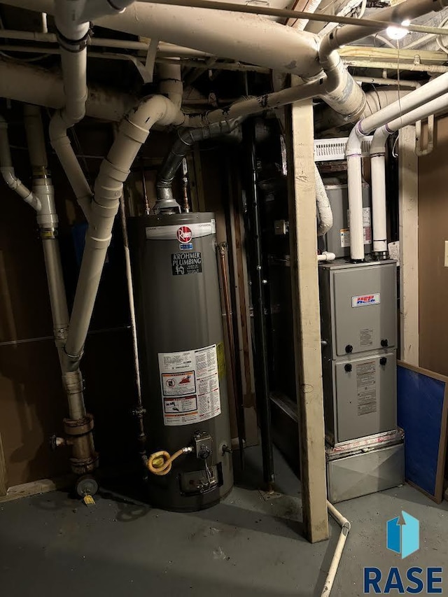 utility room with water heater