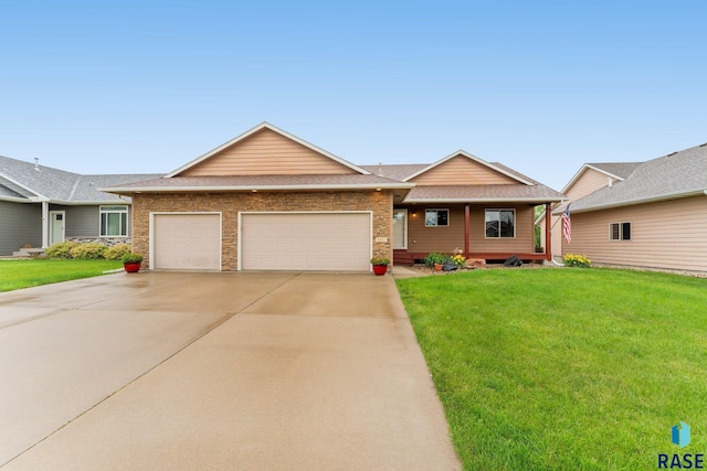 ranch-style home with driveway, a front yard, an attached garage, and a shingled roof