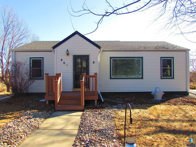 view of front of house featuring a wooden deck