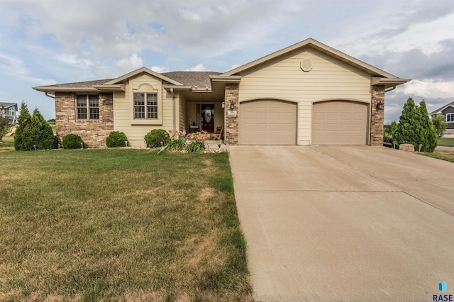 single story home with a front lawn, a garage, brick siding, and concrete driveway