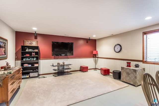 exercise area with recessed lighting and wainscoting