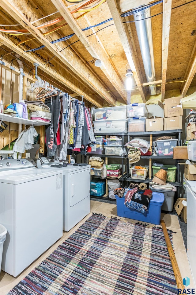 washroom with laundry area and independent washer and dryer