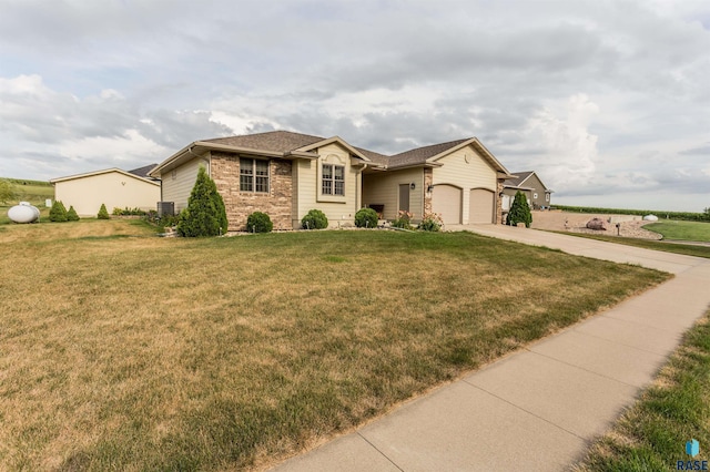 ranch-style home featuring a front yard, an attached garage, brick siding, and concrete driveway