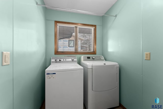 laundry area featuring washer and dryer and laundry area