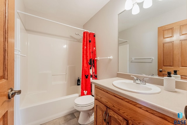 bathroom featuring tile patterned floors, toilet, shower / bath combo, and vanity