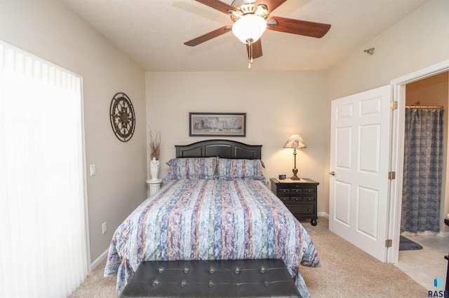 7434 S Louise Ave Unit 103, Sioux Falls, SD 57108 - bedroom with baseboards, ceiling fan, and carpet flooring