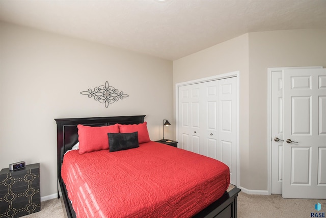 7434 S Louise Ave Unit 103, Sioux Falls, SD 57108 - bedroom featuring a closet, light colored carpet, and baseboards