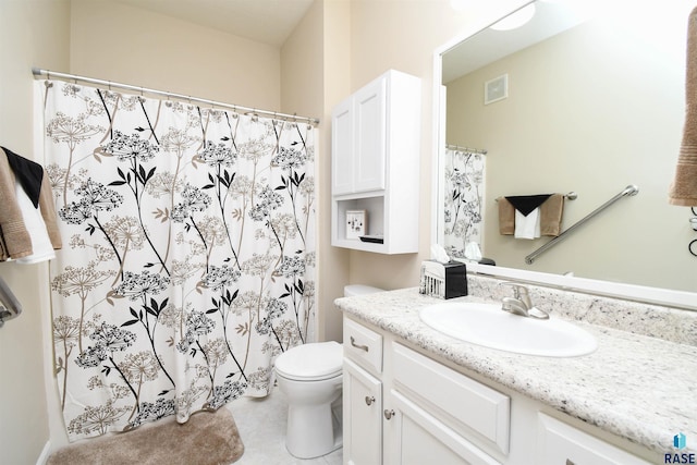 7434 S Louise Ave Unit 103, Sioux Falls, SD 57108 - full bath with visible vents, toilet, vanity, and a shower with shower curtain