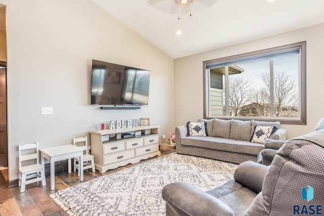 living room featuring lofted ceiling, recessed lighting, wood finished floors, and ceiling fan