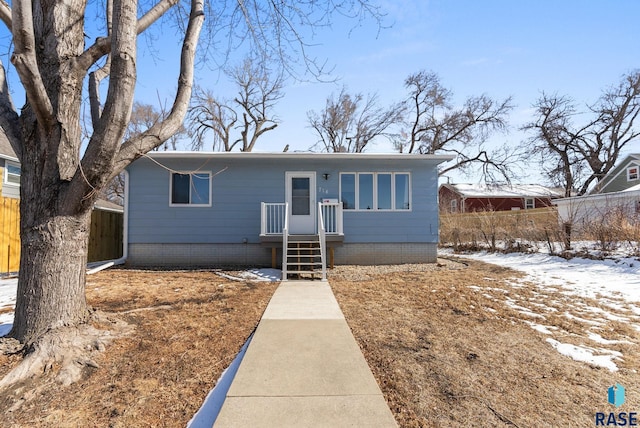 view of front of home with fence