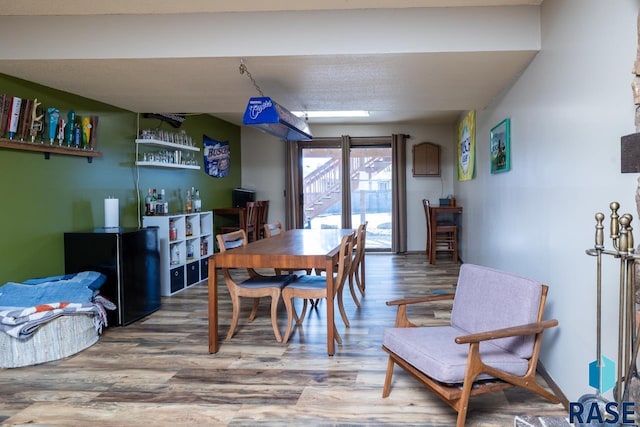 dining room with wood finished floors