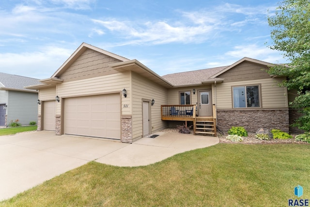 single story home with stone siding, driveway, a front lawn, and a garage