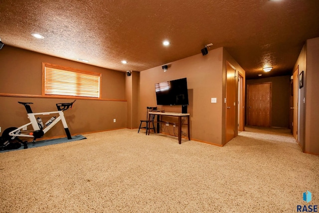 workout room with carpet, visible vents, baseboards, recessed lighting, and a textured ceiling