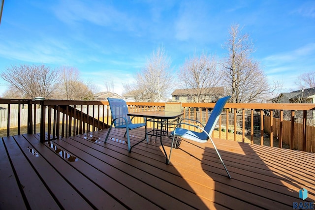 deck featuring outdoor dining area