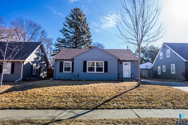 view of front of home with roof with shingles