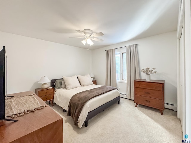 bedroom featuring light colored carpet, ceiling fan, and a baseboard radiator