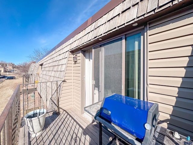 wooden terrace with grilling area