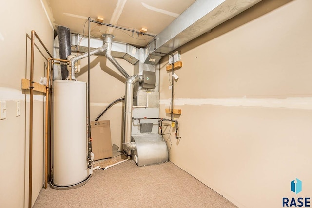 utility room featuring water heater