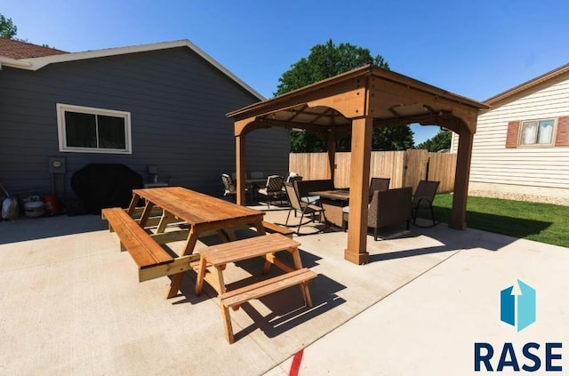 view of patio featuring area for grilling, outdoor dining space, an outdoor fire pit, a gazebo, and fence