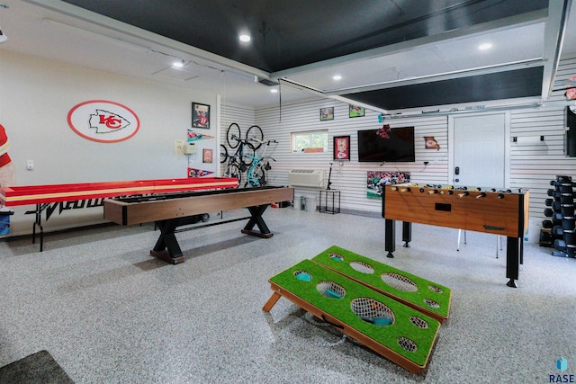 playroom with recessed lighting and speckled floor