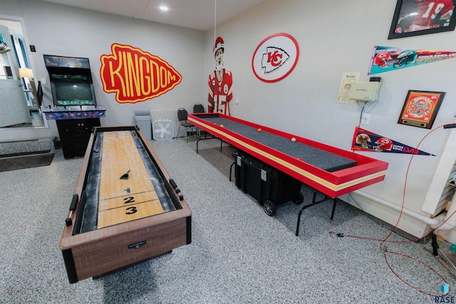 playroom featuring recessed lighting and speckled floor