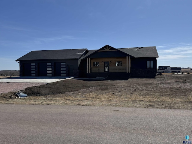 view of front of home with an attached garage and driveway