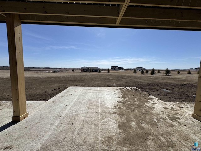 view of patio with a rural view