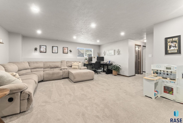 living area featuring recessed lighting, a textured ceiling, baseboards, and carpet floors