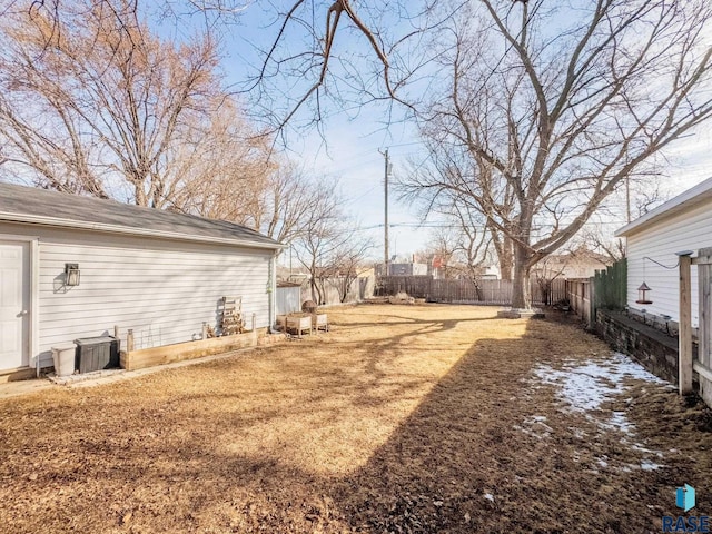 view of yard with a fenced backyard