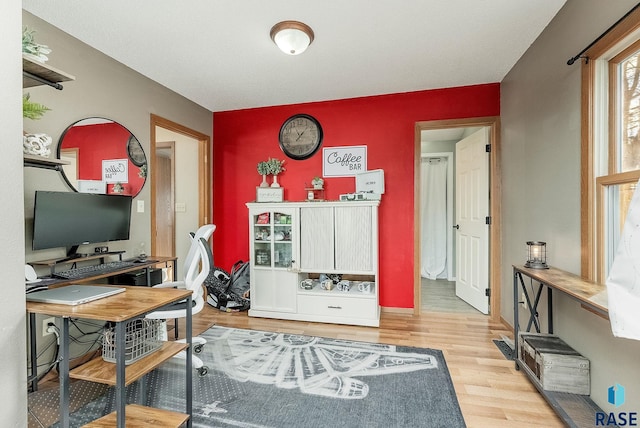 home office featuring wood finished floors