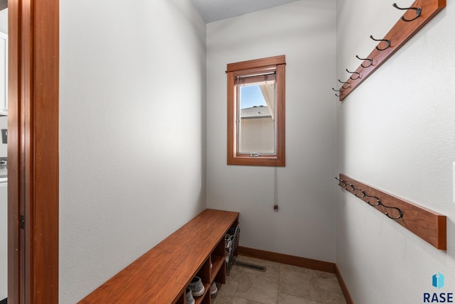 mudroom featuring baseboards